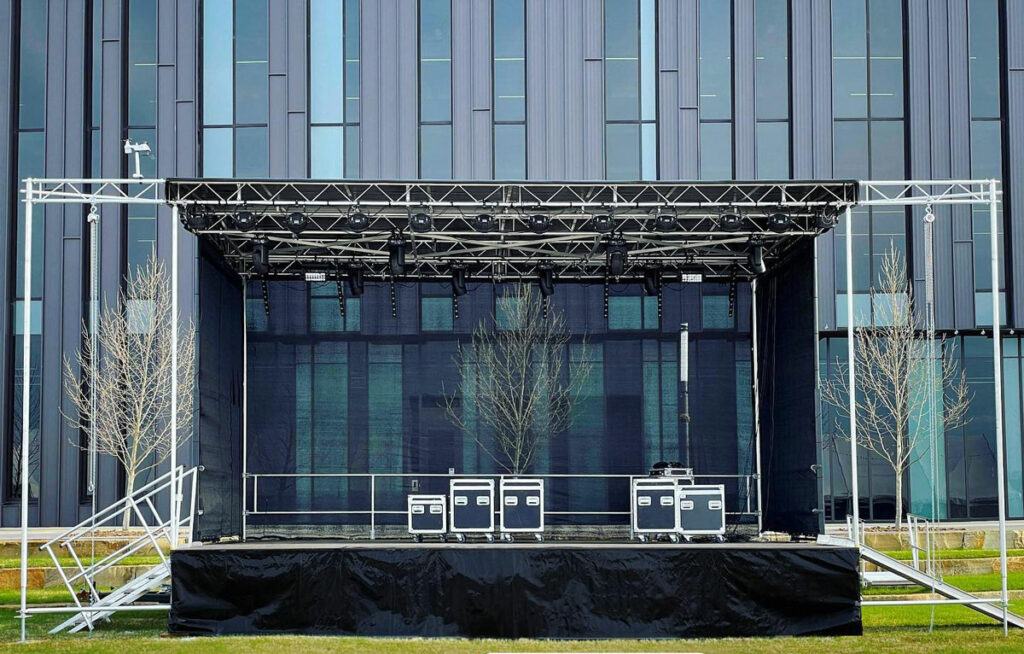Mobile stage set up for commercial business event